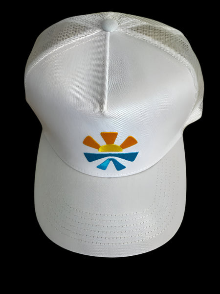 White baseball cap detail showing water resistant material and premium stitching quality
