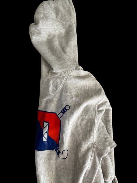Gray hoodie with a red and blue logo on the back against a black background