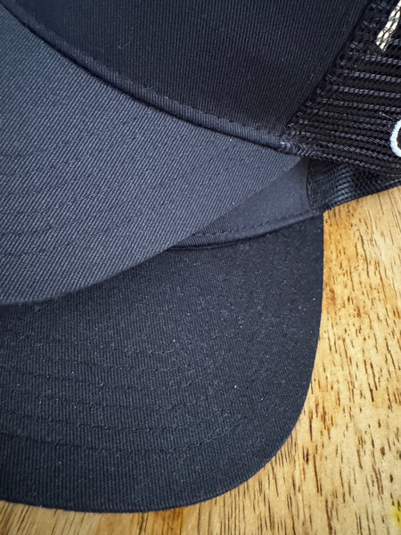 Person Wearing Black Freshy Baseball Cap - Stylish Casual Look