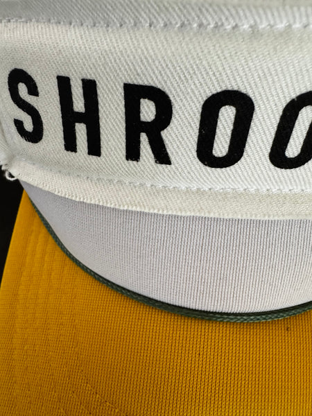 Close-up details of eco-friendly yellow baseball cap embroidery