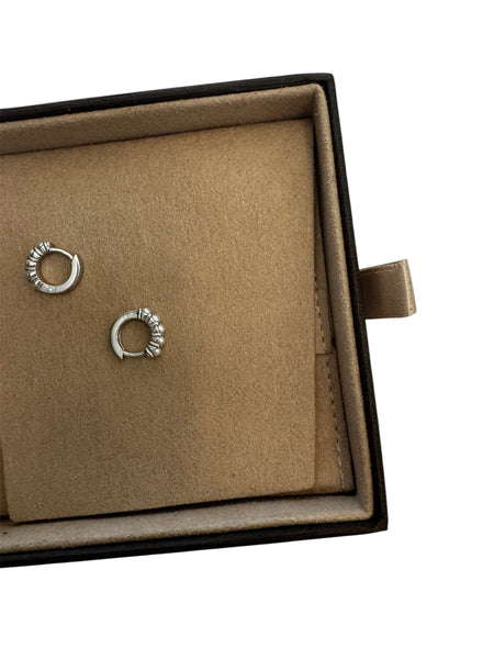 Sterling silver June pearl huggie earrings 11mm diameter product shot close-up view