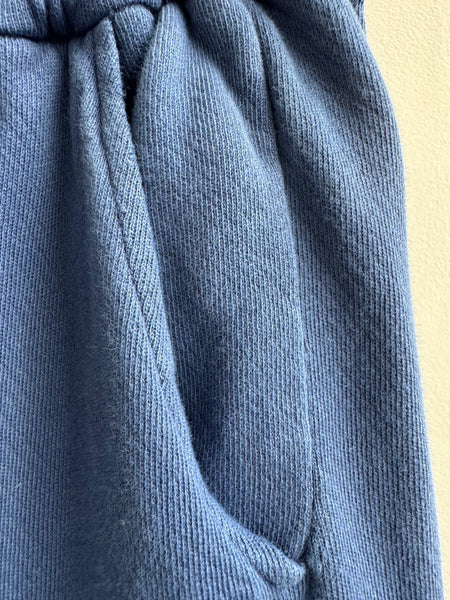 You The Brave blue jogger side detail showing premium cotton material