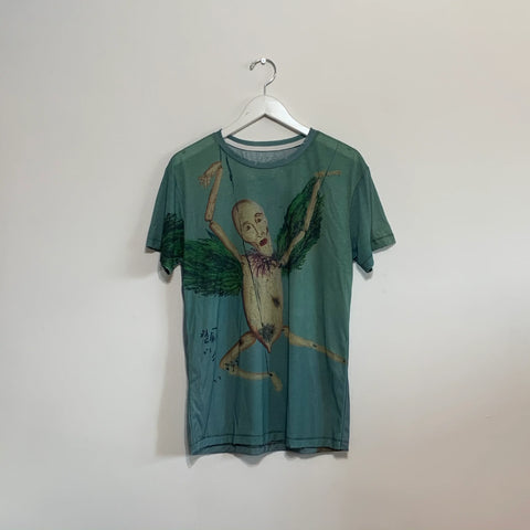 Kurt Cobain original artwork detail on olive cotton t-shirt